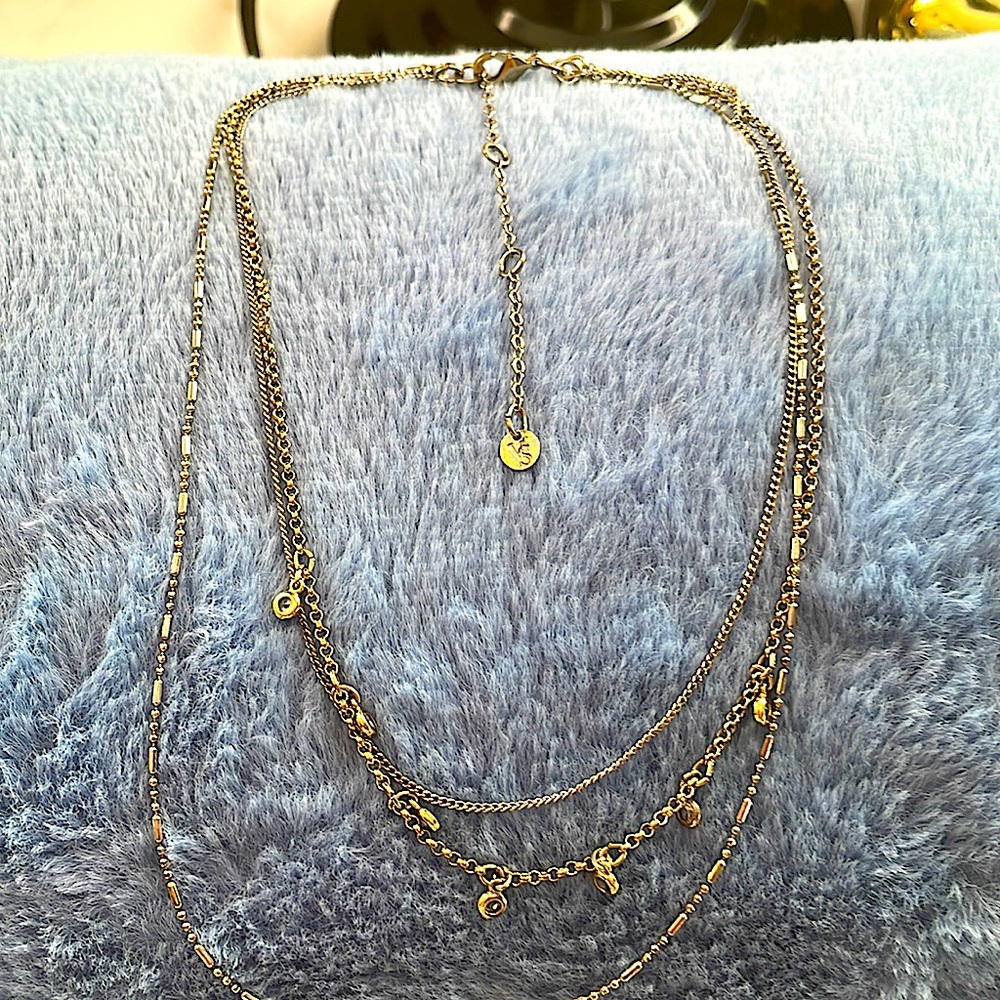 Victoria Secret gold necklace with 7 encased rhinestones